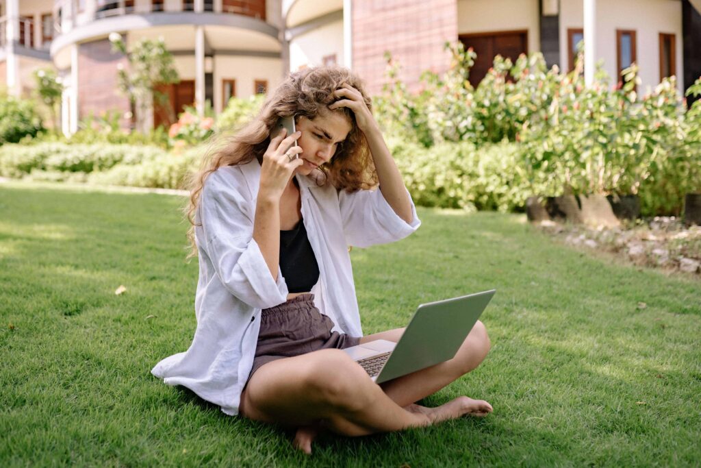 Female life coach working remotely from outside.